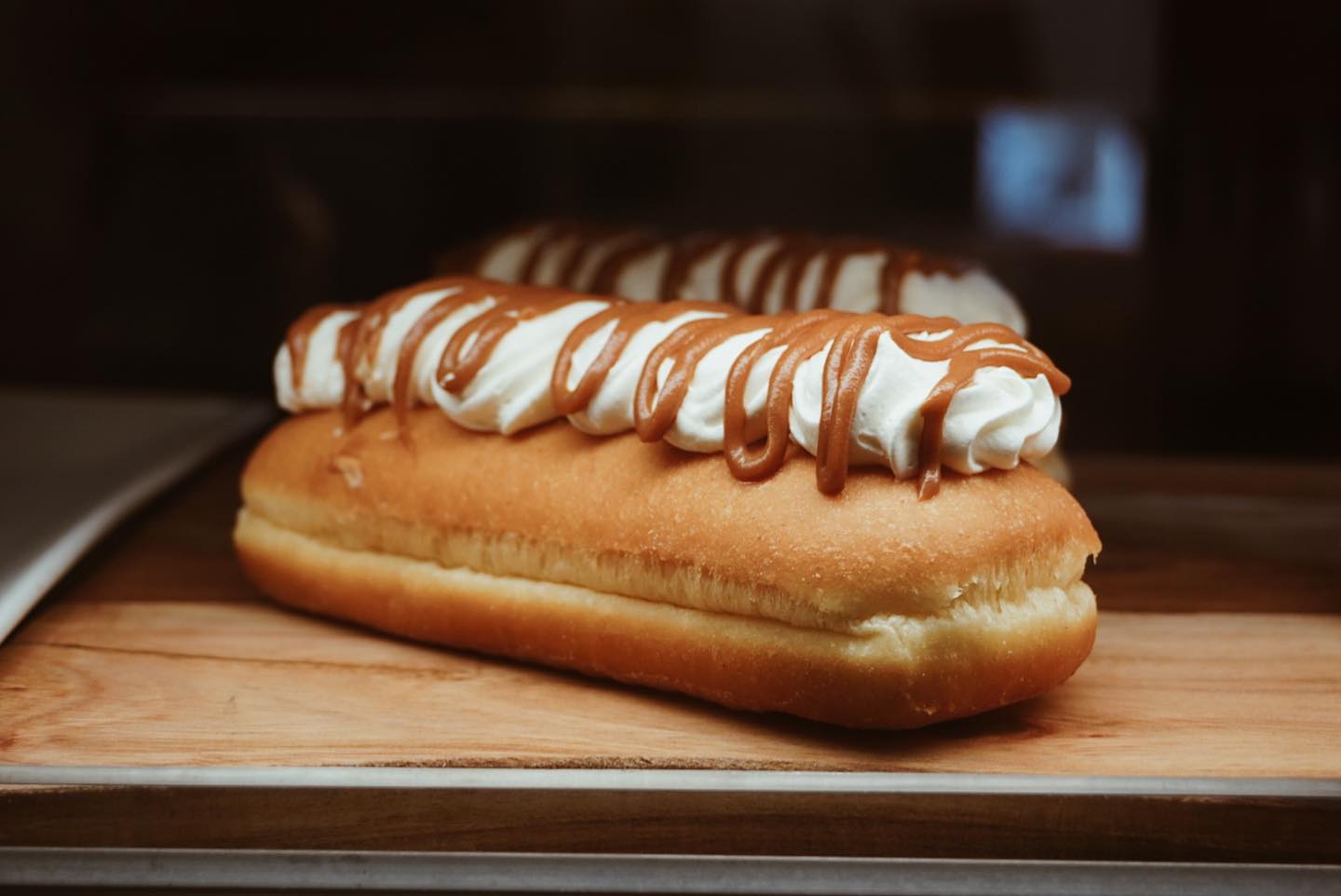 Cream-filled caramel éclair from Wash My Ride café